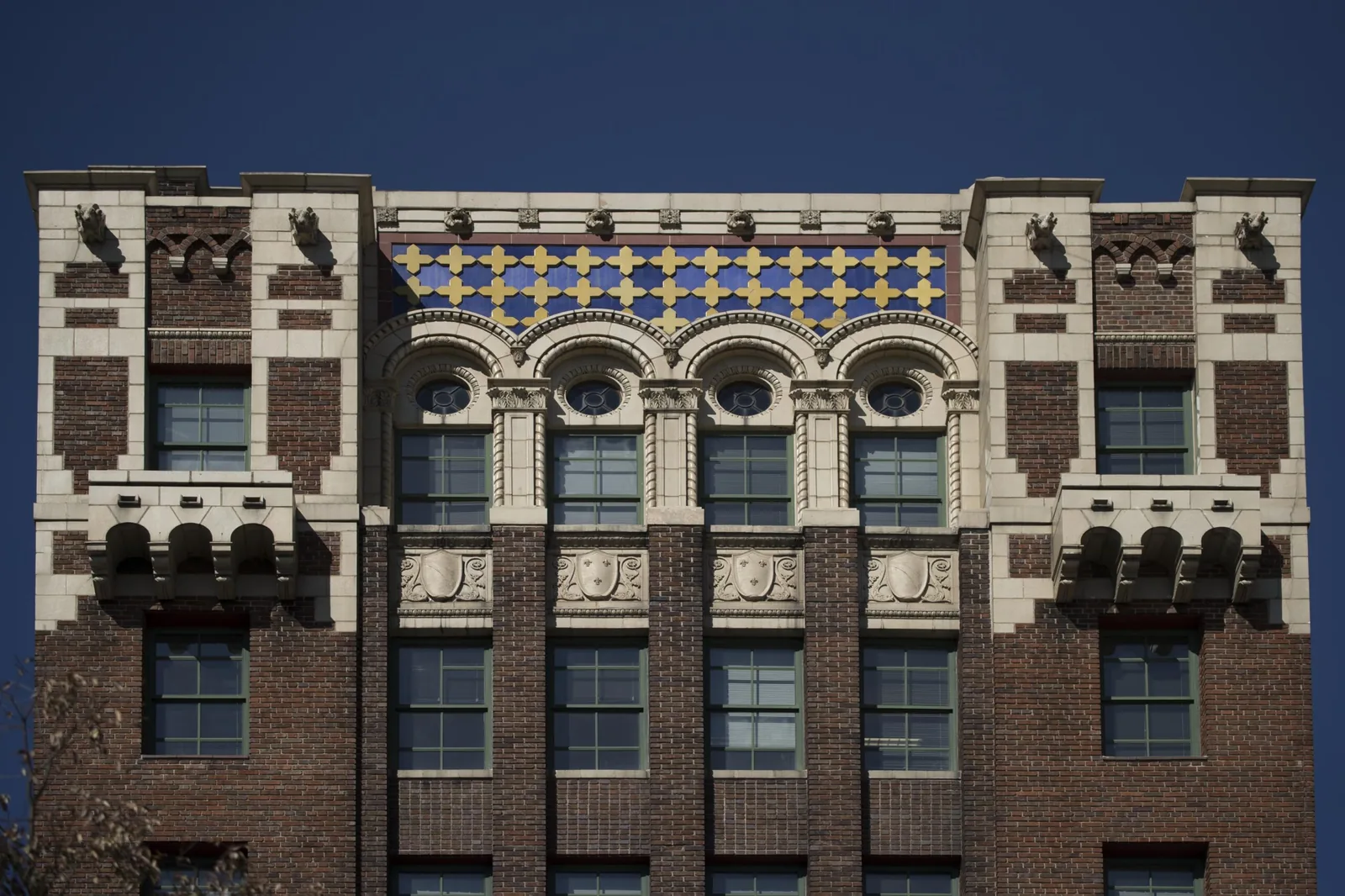 Polychrome terracotta ornament on the upper facade of the 1929 Public Service Building in downtown Asheville